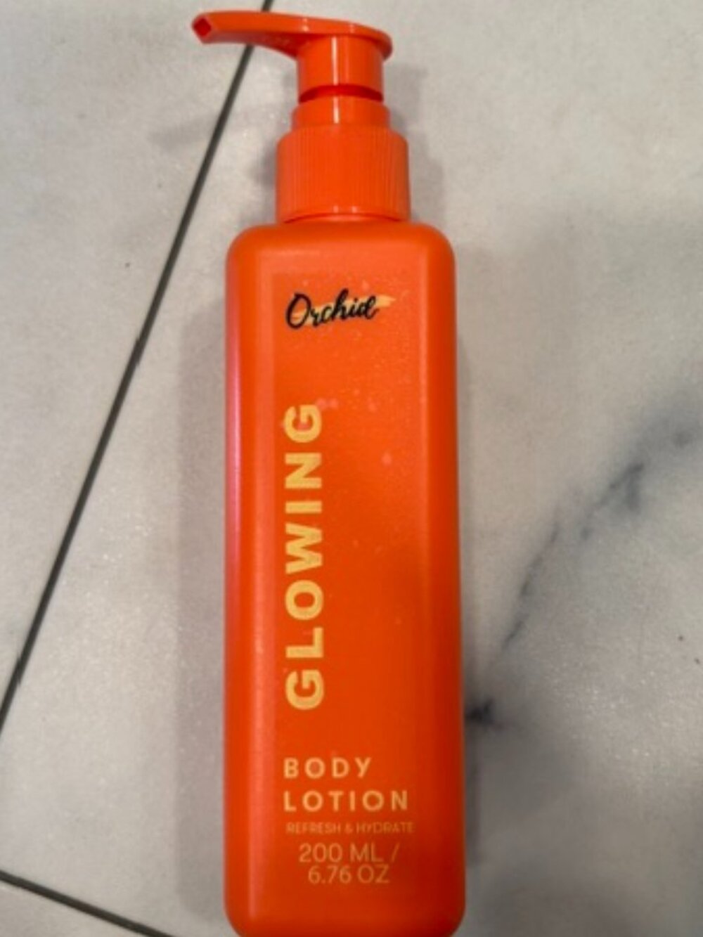 NEW- Orchid Glowing Body Lotion